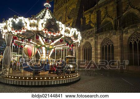 Carousel, Christmas market in Strasbourg, Alsace, France, Europe View Large Photo Image Stock Image - Carousel, Christmas market in Strasbourg, Alsace, France, Europe. Fotosearch