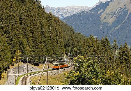 Stock Photography - Carriage of the Muerrenbahn mountain railway between Lauterbrunnen and Muerren, Bernese Oberland, Switzerland, Europe. Fotosearch