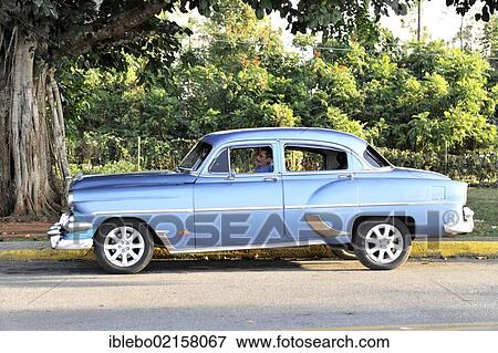 Stock Photo - Chevrolet, vintage car from the 50s, Vinales, Valle de Vinales, Province of Pinar del Rio, Cuba, Greater Antilles, Caribbean, Central America, America, North America. Fotosearch