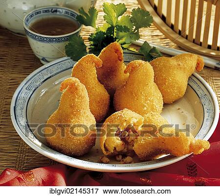 Chinese pears made from potatoes, with shrimp filling, hot starter, China, Asia View Large Photo Image Stock Photo - Chinese pears made from potatoes, with shrimp filling, hot starter, China, Asia. Fotosearch