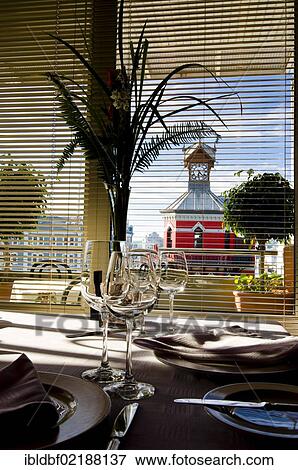 Stock Photo - Clock Tower seen from the window of a restaurant, Victoria & Alfred Waterfront, Cape Town, Western Cape, South Africa, Africa. Fotosearch