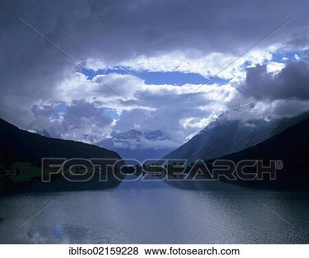 Cloudy mood at Lake Strynsvatn, Strynevatnet, near Stryn, Sogn og Fjordane, Norway, Scandinavia, Europe View Large Photo Image Stock Photo - Cloudy mood at Lake Strynsvatn, Strynevatnet, near Stryn, Sogn og Fjordane, Norway, Scandinavia, Europe. Fotosearch
