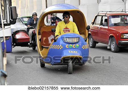 Stock Photography - Coco Taxi, in the town centre of Havana, Centro Habana, Cuba, Greater Antilles, Caribbean, Central America, America, North America. Fotosearch