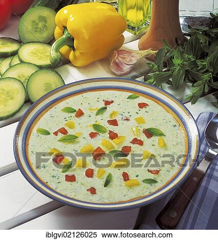 Cold cucumber soup from Hellas, well chilled, spicy, with cucumber, yogurt and fresh mint, garnished with bell pepper and tomato, Greece, Europe View Large Photo Image Stock Photography - Cold cucumber soup from Hellas, well chilled, spicy, with cucumber, yogurt and fresh mint, garnished with bell pepper and tomato, Greece, Europe. Fotosearch