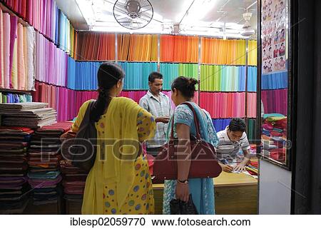 Stock Image - Colorful fabrics in a textile shop, Kathmandu, Nepal, Asia. Fotosearch