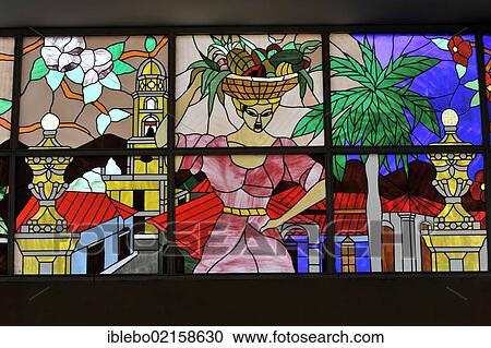 Stock Image - Coloured, stained glass windows in the lobby, reception area of the 4-star Brisas Trinidad Del Mar Hotel, Trinidad, Cuba, Greater Antilles, Caribbean, Central America, America, North America. Fotosearch