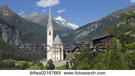 Community of Heiligenblut with the pilgrimage church of St. Vinzenz, Carinthia, Austria, Europe View Large Photo Image Stock Photography - Community of Heiligenblut with the pilgrimage church of St. Vinzenz, Carinthia, Austria, Europe. Fotosearch