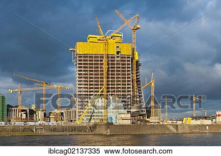 Stock Photography - Construction of the European Central Bank, ECB, on the grounds of the former wholesale market hall, seen from the shores of Sachsenhausen, Frankfurt am Main, Hesse, Germany, Europe. Fotosearch