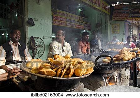 Cookshop in the streets of Varanasi, Uttar Pradesh, India, Asia View Large Photo Image Picture - Cookshop in the streets of Varanasi, Uttar Pradesh, India, Asia. Fotosearch