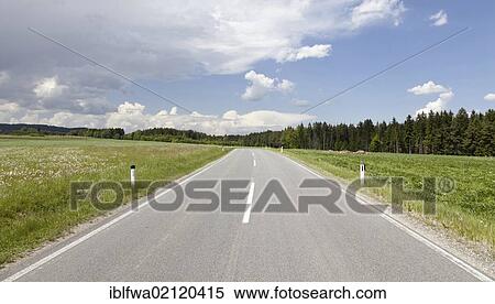 Stock Photography - Country road in Waldviertel Region, forest quarter, Lower Austria, Austria, Europe. Fotosearch