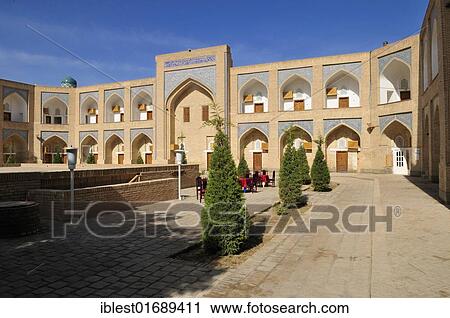 Stock Image - Courtyard of Muhammad Aminkhan Madrassah, Hotel Khiva, Chiva, Ichan Kala, Silk Road, Unesco World Heritage Site, Uzbekistan, Central Asia, Asia. Fotosearch