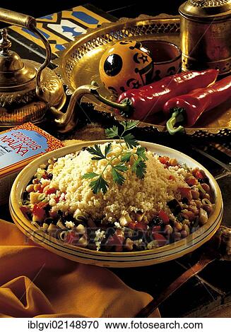 Couscous with vegetables, leeks, peppers, eggplant, chickpeas and currants, Tunisia, Africa View Large Photo Image Stock Image - Couscous with vegetables, leeks, peppers, eggplant, chickpeas and currants, Tunisia, Africa. Fotosearch