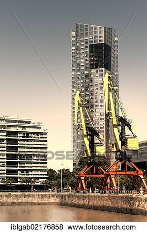 Stock Photo - Cranes and buildings at Puerto Madero, Buenos Aires, Argentina, South America. Fotosearch