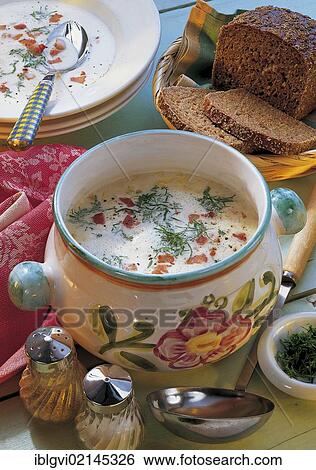Stock Photograph - Cream of chicory soup with bacon bits and herbs, hot starter, Belgium, Europe. Fotosearch