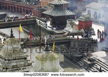 Cremation ground, temple of Pashupatinath on the holy Bagmati River, Kathmandu, Nepal, Asia View Large Photo Image Stock Photo - Cremation ground, temple of Pashupatinath on the holy Bagmati River, Kathmandu, Nepal, Asia. Fotosearch