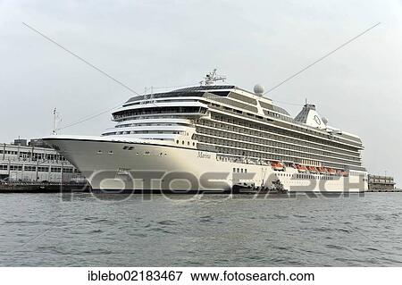 Stock Photo - Cruise ship, Marina, approaching the port, built in 2009, 1258 passengers, 236m long, Venice, Veneto, Italy, Europe. Fotosearch