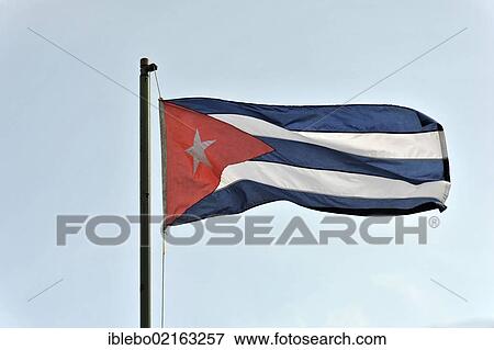 Cuban flag flying in the wind, Cuba, North America View Large Photo Image Stock Photo - Cuban flag flying in the wind, Cuba, North America. Fotosearch
