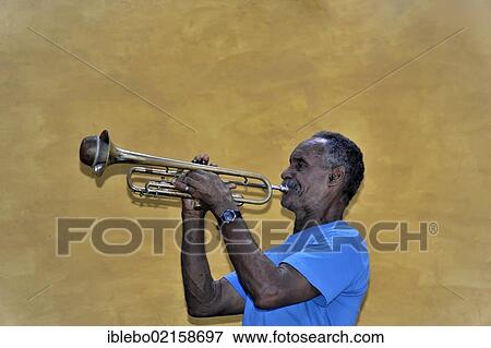 Cuban musician playing the trumpet, trumpeter, portrait, Trinidad, Cuba, Greater Antilles, Caribbean, Central America, America, North America View Large Photo Image Stock Photo - Cuban musician playing the trumpet, trumpeter, portrait, Trinidad, Cuba, Greater Antilles, Caribbean, Central America, America, North America. Fotosearch