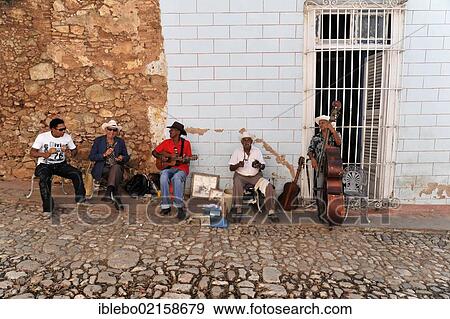 Stock Photo - Cuban musicians in a side street, cobbled street, old town, Trinidad, Cuba, Greater Antilles, Caribbean, Central America, America, North America. Fotosearch