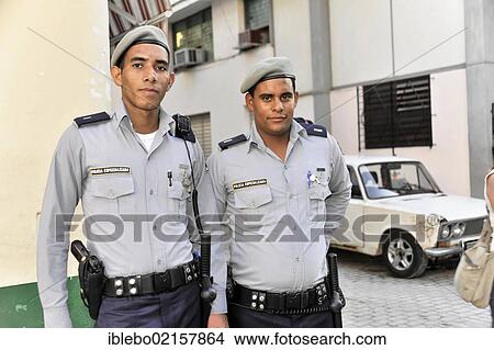 Cuban police officers, Policia Especializada, town centre of Havana, Centro Habana, Cuba, Greater Antilles, Caribbean, Central America, America, North America View Large Photo Image Picture - Cuban police officers, Policia Especializada, town centre of Havana, Centro Habana, Cuba, Greater Antilles, Caribbean, Central America, America, North America. Fotosearch