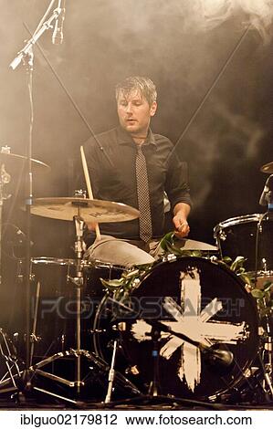 Stock Image - Daniel Fischer, drummer of the Swiss band Delilah, performing live in the Schueuer concert hall, Lucerne, Switzerland, Europe. Fotosearch