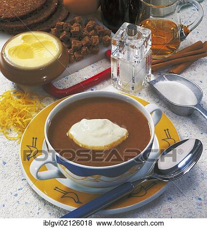 Stock Photo - Danish beer and ginger soup with brown bread, malt beer, cream, Denmark, Europe. Fotosearch