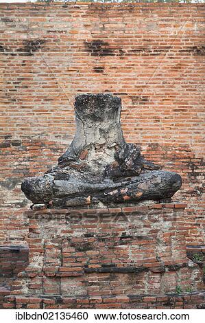 Decapitated Buddha statue at Wat Ratchaburana, Ayutthaya, Thailand, Asia View Large Photo Image Stock Image - Decapitated Buddha statue at Wat Ratchaburana, Ayutthaya, Thailand, Asia. Fotosearch