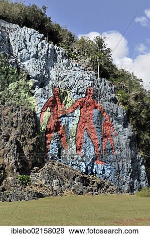 Stock Photo - Detail, partial view, Mural de la Prehistoria, prehistoric wall, painted in 1961 by Mexican artist Leovigildo González Morillo, size 120x180 meters, Vinales, UNESCO World Heritage Site, Province of Pinar del Rio, Cuba, Greater Antilles, Caribbean,.... Fotosearch