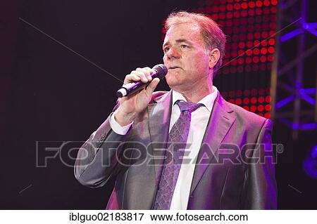 Dutch pop singer Hendrik Simons, "Heintje", performing live at the Schlager Nacht 2012, pop music event, in Lucerne, Switzerland, Europe View Large Photo Image Stock Photo - Dutch pop singer Hendrik Simons, "Heintje", performing live at the Schlager Nacht 2012, pop music event, in Lucerne, Switzerland, Europe. Fotosearch