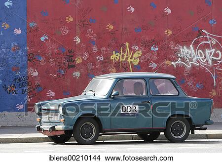 East German car (Trabi) in front of East Side Gallery in Berlin, Germany, Europe View Large Photo Image Picture - East German car (Trabi) in front of East Side Gallery in Berlin, Germany, Europe. Fotosearch