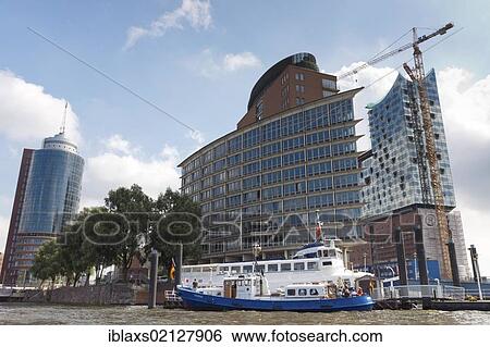 Stock Photograph - Elbphilharmonie Hamburg concert hall seen from the Elbe River, Hamburg, Germany, Europe. Fotosearch