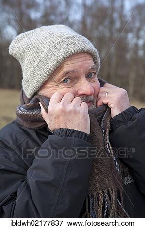 Elderly man in winter clothes, Beversee Nature Reserve, Bergkamen, Unna district, Ruhr Area, North Rhine-Westphalia, Germany, Europe View Large Photo Image Stock Photo - Elderly man in winter clothes, Beversee Nature Reserve, Bergkamen, Unna district, Ruhr Area, North Rhine-Westphalia, Germany, Europe. Fotosearch