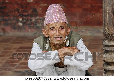 Stock Image - Elderly man wearing a traditional headdress, Pashupatinath, Kathmandu, Nepal, Asia. Fotosearch