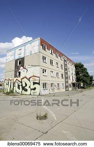 Stock Photography - Empty block of flats with graffiti on it in East Berlin. Fotosearch