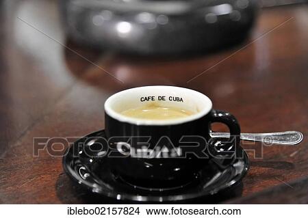 Picture - Espresso Cubita, small cup of coffee, tourist shop, town centre of Havana, Centro Habana, Cuba, Greater Antilles, Caribbean, Central America, America, North America. Fotosearch