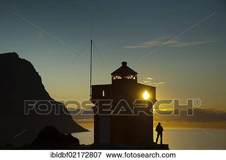 Evening mood, woman at Ósvoer Lighthouse, town of Bolungarvik, Ísafjarðardjúp, Isafjardardjup Fjord, Westfjords, Iceland, Europe View Large Photo Image Stock Photo - Evening mood, woman at Ósvoer Lighthouse, town of Bolungarvik, Ísafjarðardjúp, Isafjardardjup Fjord, Westfjords, Iceland, Europe. Fotosearch