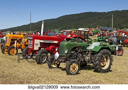 Exhibition of vintage tractors and other farm machinery, Tracto Mania, La Brevine, Neuchâtel Jura, Switzerland, Europe View Large Photo Image Stock Photo - Exhibition of vintage tractors and other farm machinery, Tracto Mania, La Brevine, Neuchâtel Jura, Switzerland, Europe. Fotosearch
