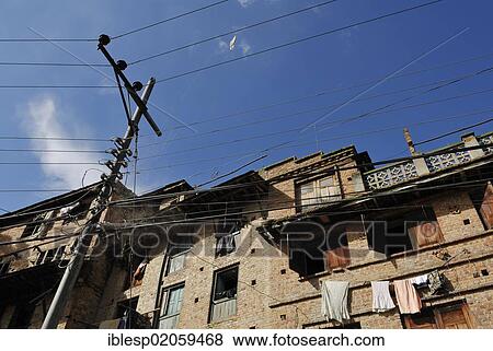 Stock Photo - Facades, power pole, Bhaktapur, Kathmandu Valley, Nepal, Asia. Fotosearch