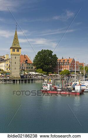 Fire-fighting boat in the harbour, Mangturm tower, Lindau, Lake Constance, Baden-Wuerttemberg, southern Germany, Germany, Europe View Large Photo Image Stock Photo - Fire-fighting boat in the harbour, Mangturm tower, Lindau, Lake Constance, Baden-Wuerttemberg, southern Germany, Germany, Europe. Fotosearch
