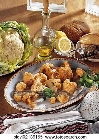 Stock Photography - Fried cauliflower in oriental breadcrumbs with vegetables, Egypt, Africa. Fotosearch