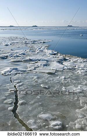 Frozen North Sea with the Hallig Hooge, holm, on the horizon, North Frisia, Schleswig-Holstein, Northern Germany, Germany, Europe View Large Photo Image Stock Photo - Frozen North Sea with the Hallig Hooge, holm, on the horizon, North Frisia, Schleswig-Holstein, Northern Germany, Germany, Europe. Fotosearch
