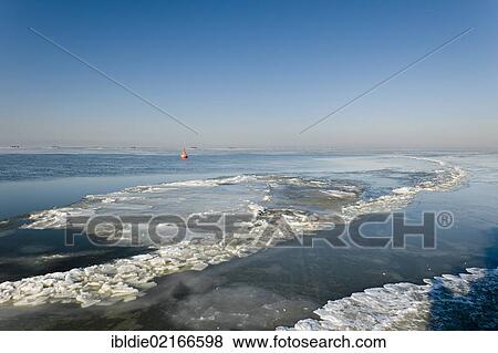 Frozen North Sea with the Hallig Langeness, holm, on the horizon, North Frisia, Schleswig-Holstein, Northern Germany, Germany, Europe View Large Photo Image Stock Photo - Frozen North Sea with the Hallig Langeness, holm, on the horizon, North Frisia, Schleswig-Holstein, Northern Germany, Germany, Europe. Fotosearch