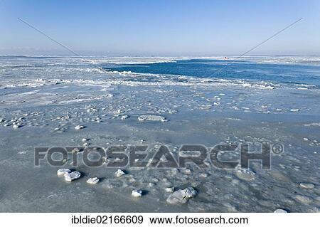 Frozen North Sea with the Hallig Langeness, holm, on the horizon, North Frisia, Schleswig-Holstein, Northern Germany, Germany, Europe View Large Photo Image Stock Photo - Frozen North Sea with the Hallig Langeness, holm, on the horizon, North Frisia, Schleswig-Holstein, Northern Germany, Germany, Europe. Fotosearch