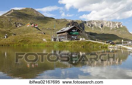 Fuscher Lacke lake, 2262m above sea level, and restaurant, Grossglockner High Alpine Road, Hohe Tauern National Park, Austria, Europe View Large Photo Image Stock Photography - Fuscher Lacke lake, 2262m above sea level, and restaurant, Grossglockner High Alpine Road, Hohe Tauern National Park, Austria, Europe. Fotosearch
