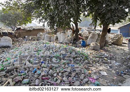 Garbage piled up in the streets of Allahabad, Uttar Pradesh, India, Asia View Large Photo Image Stock Photo - Garbage piled up in the streets of Allahabad, Uttar Pradesh, India, Asia. Fotosearch