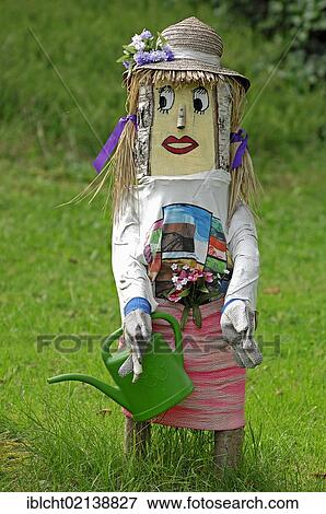 Stock Photo - Garden figure in a garden, Undeloh, Lueneburg Heath, Lower Saxony, Germany, Europe. Fotosearch