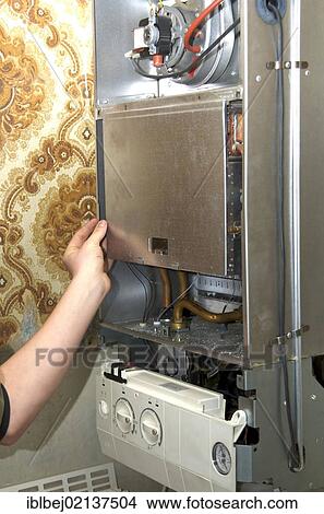 Gas boiler maintenance View Large Photo Image Picture - Gas boiler maintenance. Fotosearch
