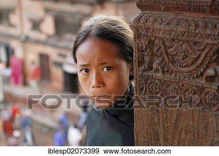 Stock Photo - Girl, Nyatapola Pagoda, Taumadhi Square, Bhaktapur, Kathmandu Valley, Nepal, Asia. Fotosearch