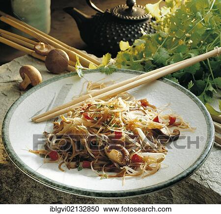 Stock Image - Glass noodle salad with bean sprouts, shiitake mushrooms, fresh vegetables and ginger dressing, Vietnam, Asia. Fotosearch