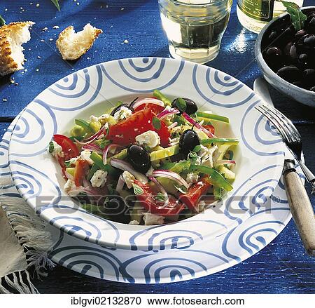 Greek salad, with cucumber, peppers, tomatoes, red onion, black olives and feta cheese, Greece, Europe View Large Photo Image Stock Image - Greek salad, with cucumber, peppers, tomatoes, red onion, black olives and feta cheese, Greece, Europe. Fotosearch